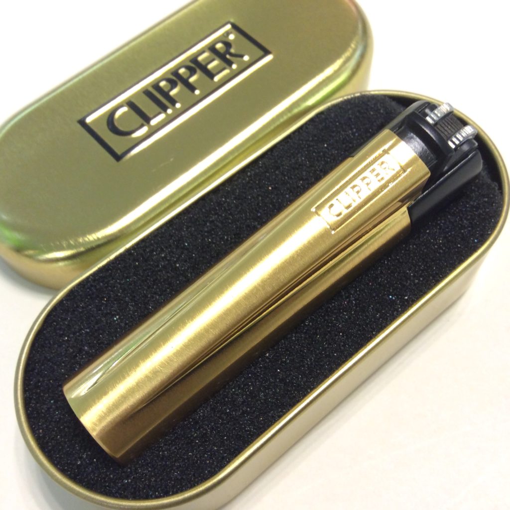briquet clipper or et noir