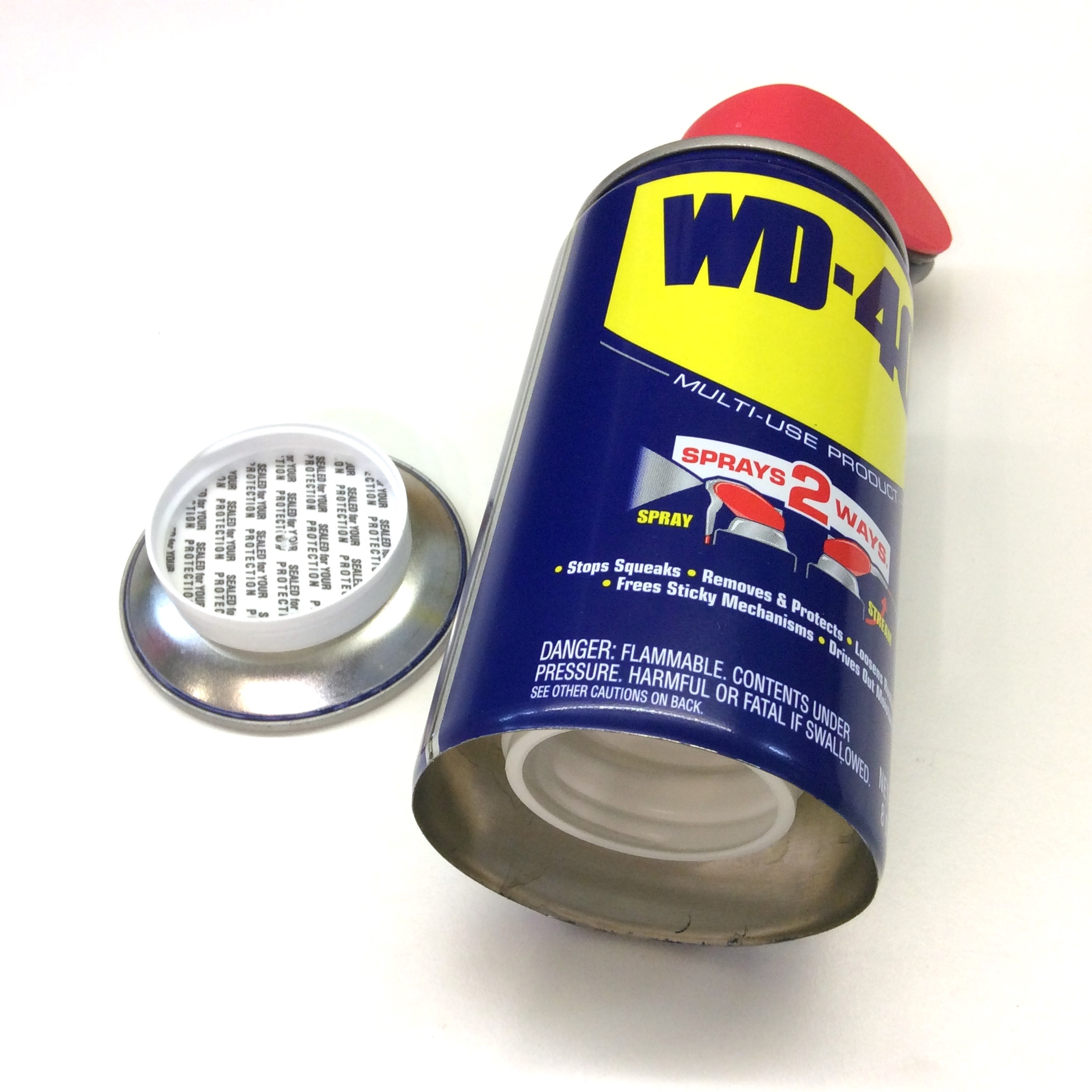 Bouteille WD40 cachette